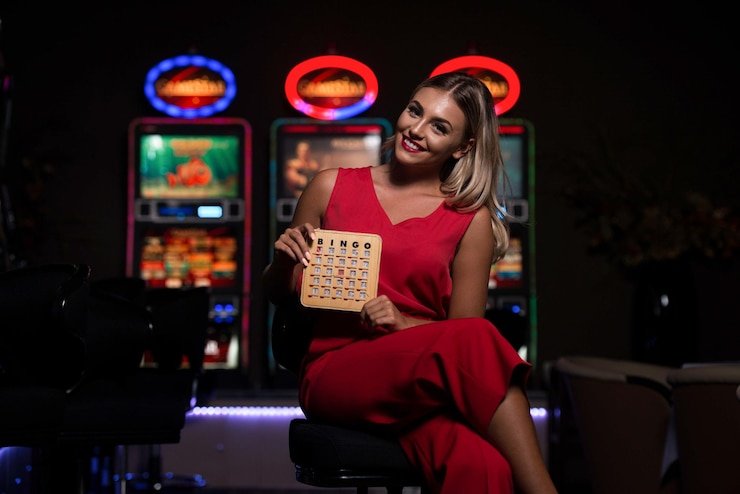 Player making strategic decision between hitting and standing in blackjack game